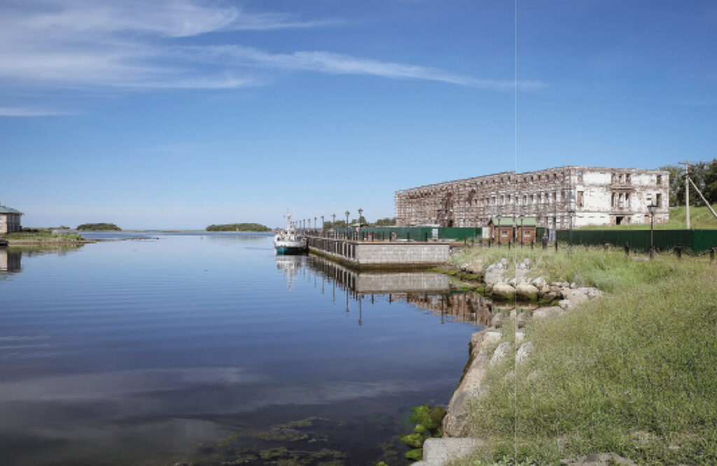 Laivalaituri, jossa yksi pieni laiva. Paljon vettä ja taivasta, aurinkoinen sää.