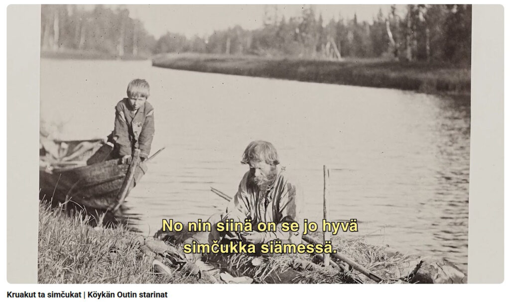 Vanhassa seepiansävyisessä kuvassa, joen rannalla, parrakas mies näprää jotain, availee simpukoita. Joen rannalta veneen kokasta kurkottelee pieni poika kohti miestä ja katsoo jännittyneenä, mitä mies tekee, mitä löytää.